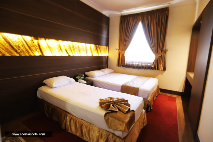 اتاق سه تخته هتل آپارتمان مهر مشهد